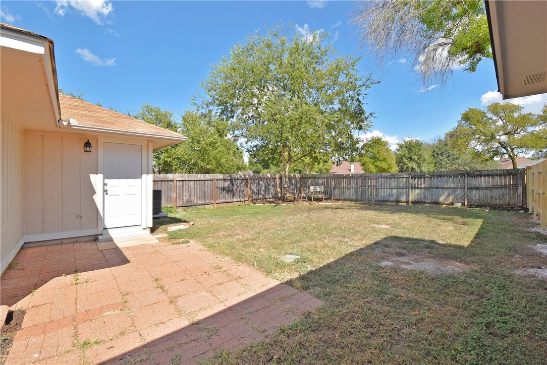 16813 Whitebrush Loop Austin, TX 78717 - Photo 18 of 22 a view of a backyard