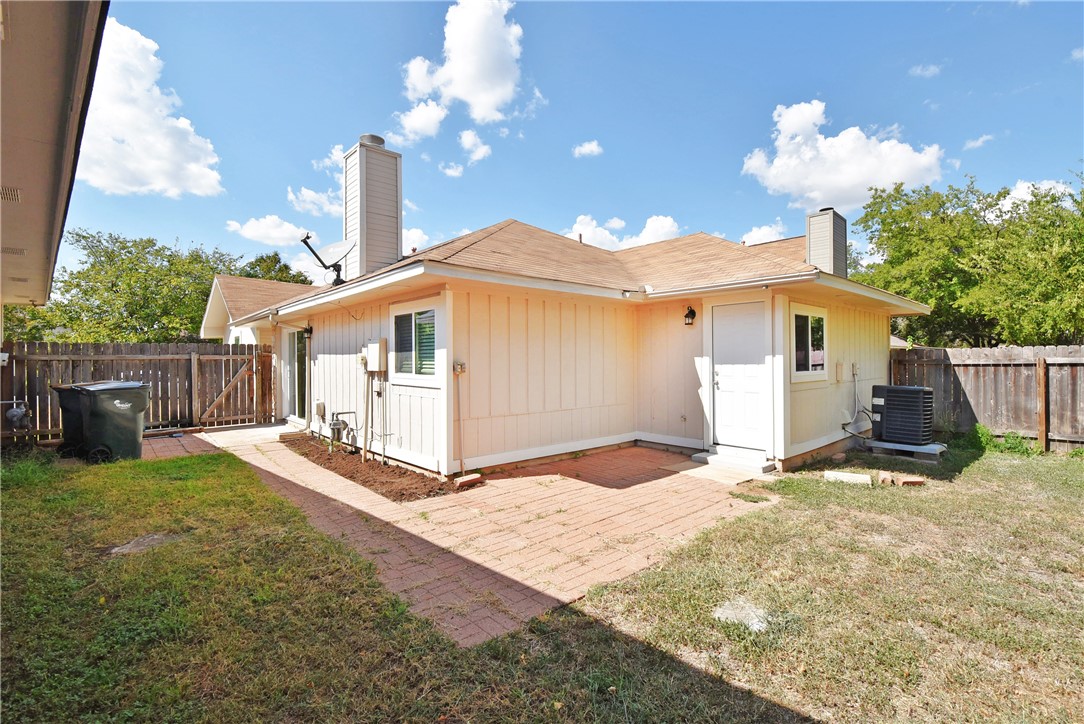 16813 Whitebrush Loop Austin, TX 78717 - Photo 19 of 22 a view of a house with backyard and sitting area
