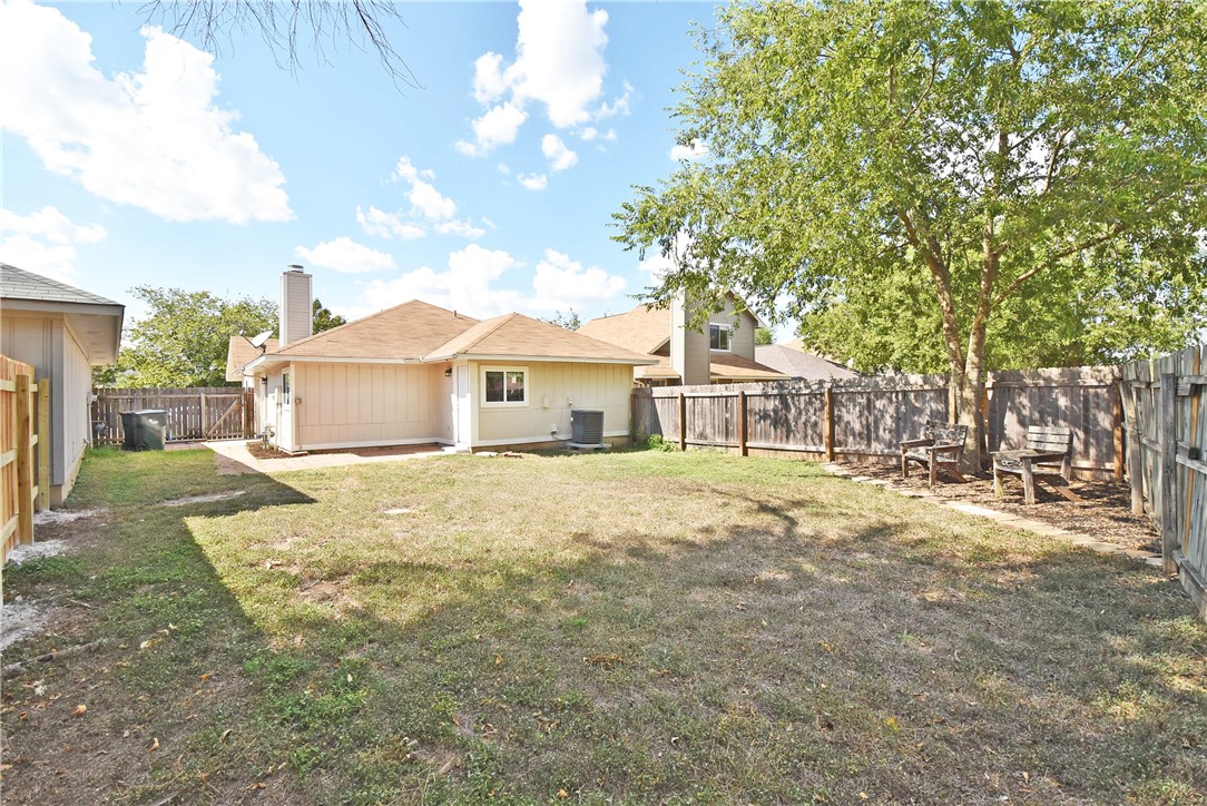 16813 Whitebrush Loop Austin, TX 78717 - Photo 20 of 22 a front view of a house with a garden