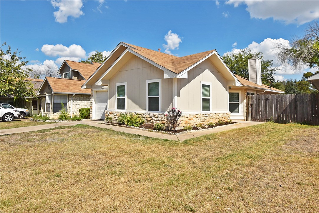 16813 Whitebrush Loop Austin, TX 78717 - Photo 2 of 22 a view of a yard in front of house