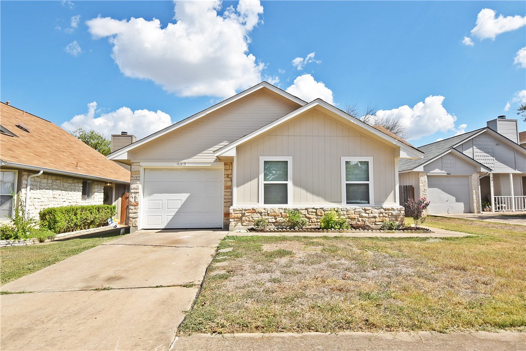 16813 Whitebrush Loop Austin, TX 78717 - Photo 21 of 22 a front view of a house with garden