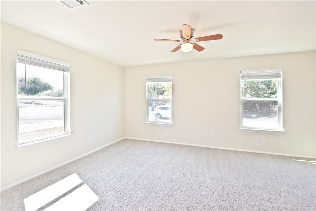 16813 Whitebrush Loop Austin, TX 78717 - Photo 22 of 22 a view of an empty room with a window
