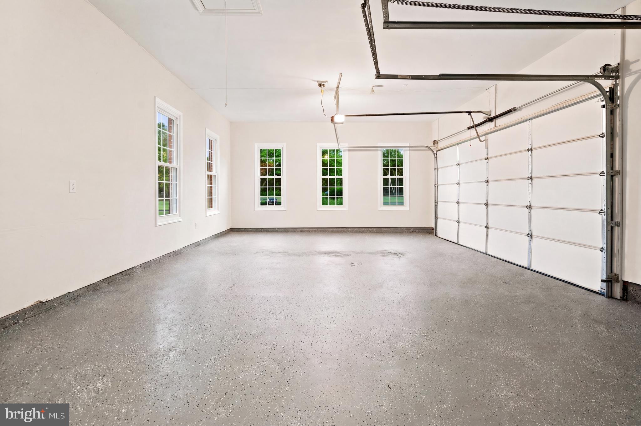 9313 Harrisons Farm Way Laytonsville, MD 20882 - Photo 61 of 77 a view of a big room with windows and chandelier fan