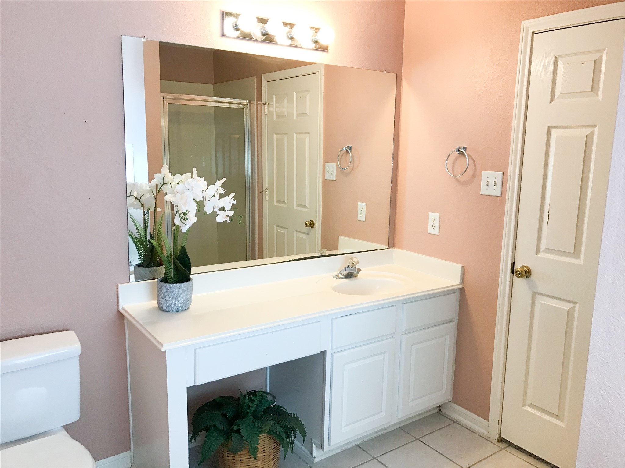14615 Rochelle Court Cypress, TX 77429 - Photo 19 of 29 a bathroom with a sink and a mirror