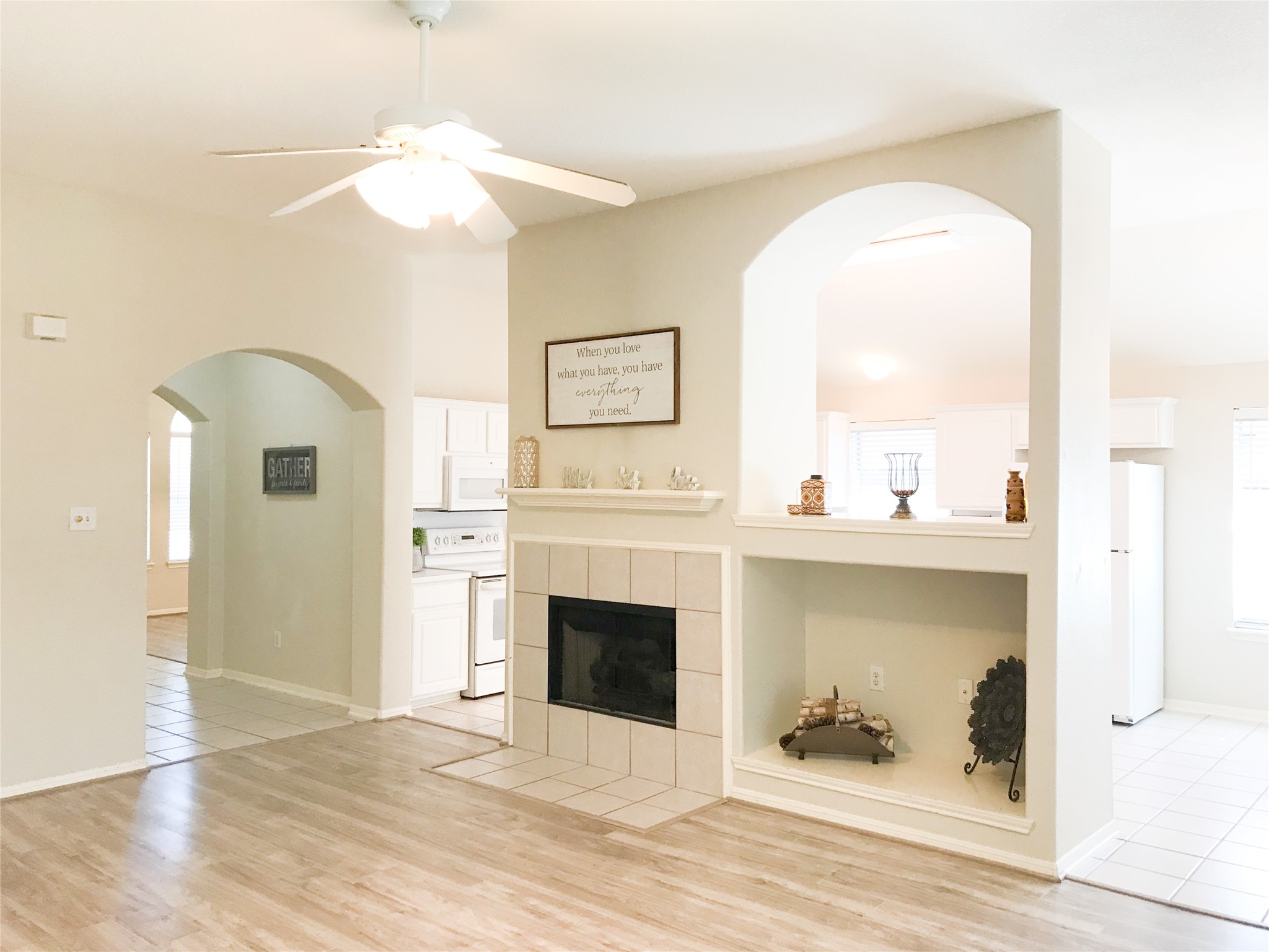 14615 Rochelle Court Cypress, TX 77429 - Photo 6 of 29 a view of a livingroom with a fireplace and wooden floor