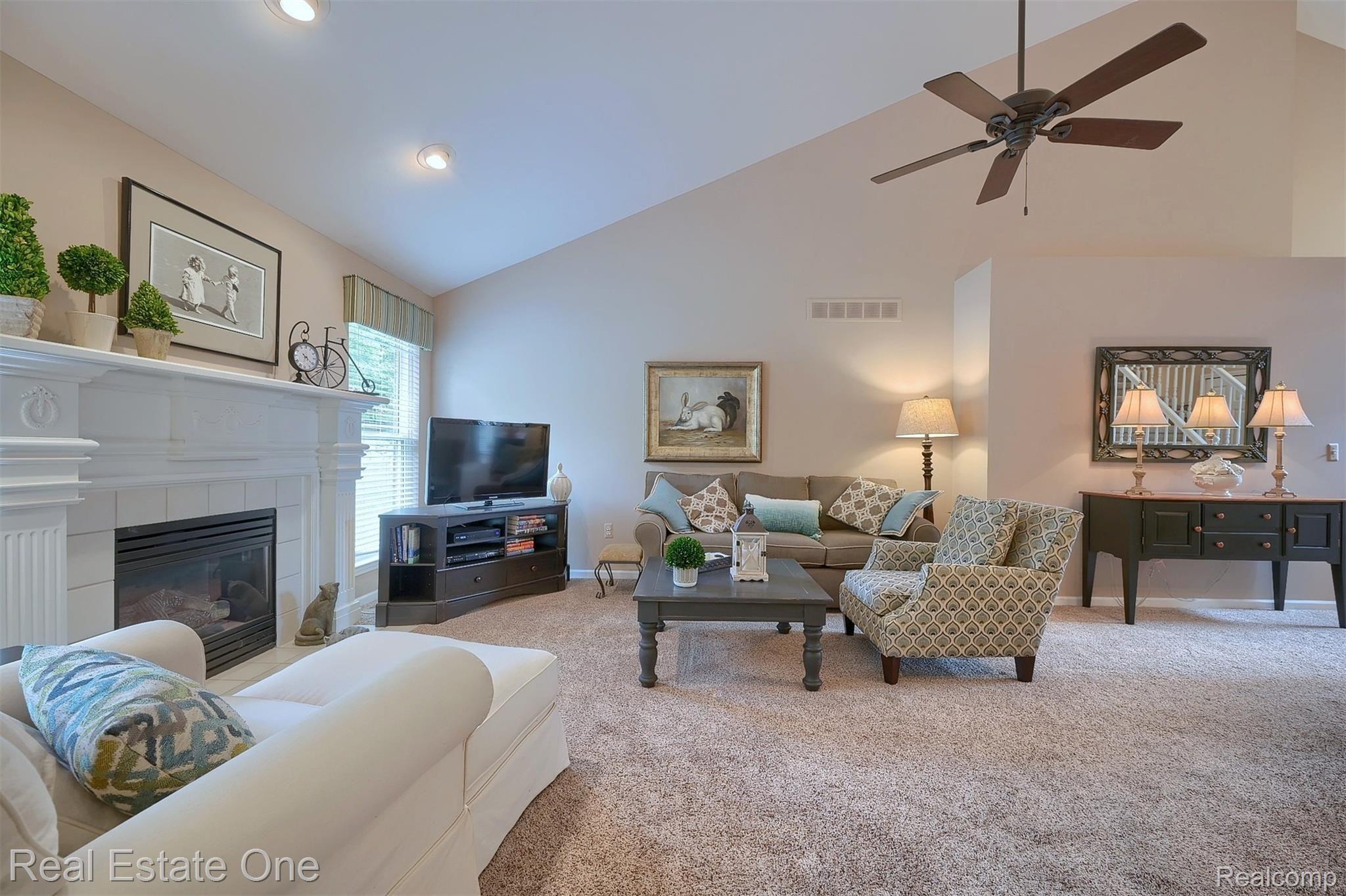 917 Churchill Circle, Unit 63 Rochester, MI 48307 - Photo 6 of 30 Cathedral Ceiling with Ceiling Fan plus Neutral decor!