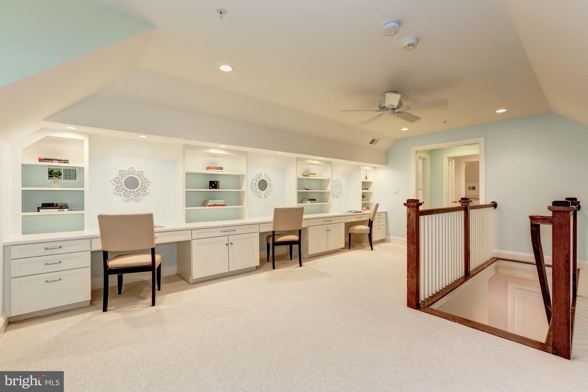 7003 Brookville Road Chevy Chase, MD 20815 - Photo 23 of 30 a large white kitchen with cabinets