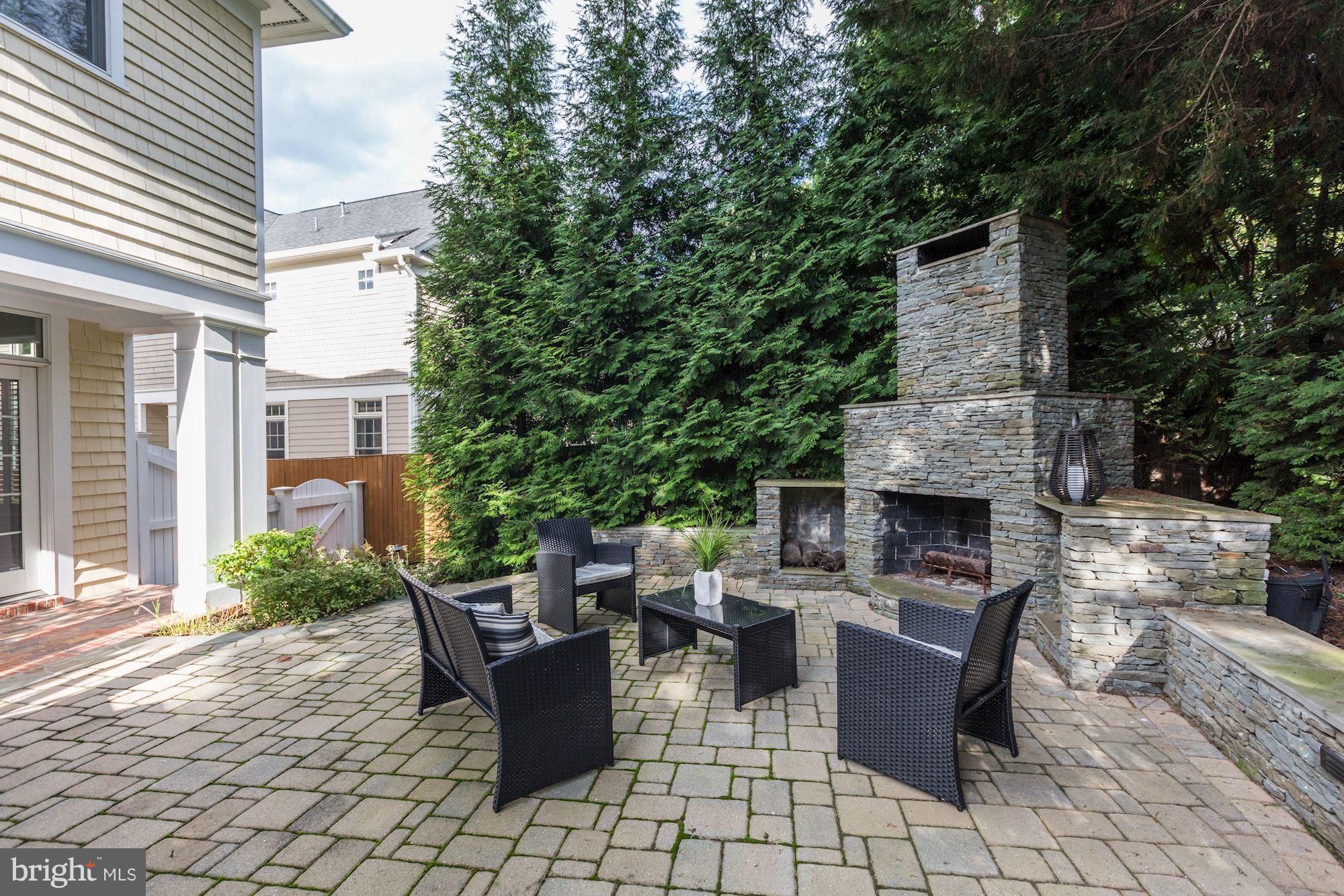 7003 Brookville Road Chevy Chase, MD 20815 - Photo 29 of 30 a view of a patio with table and chairs