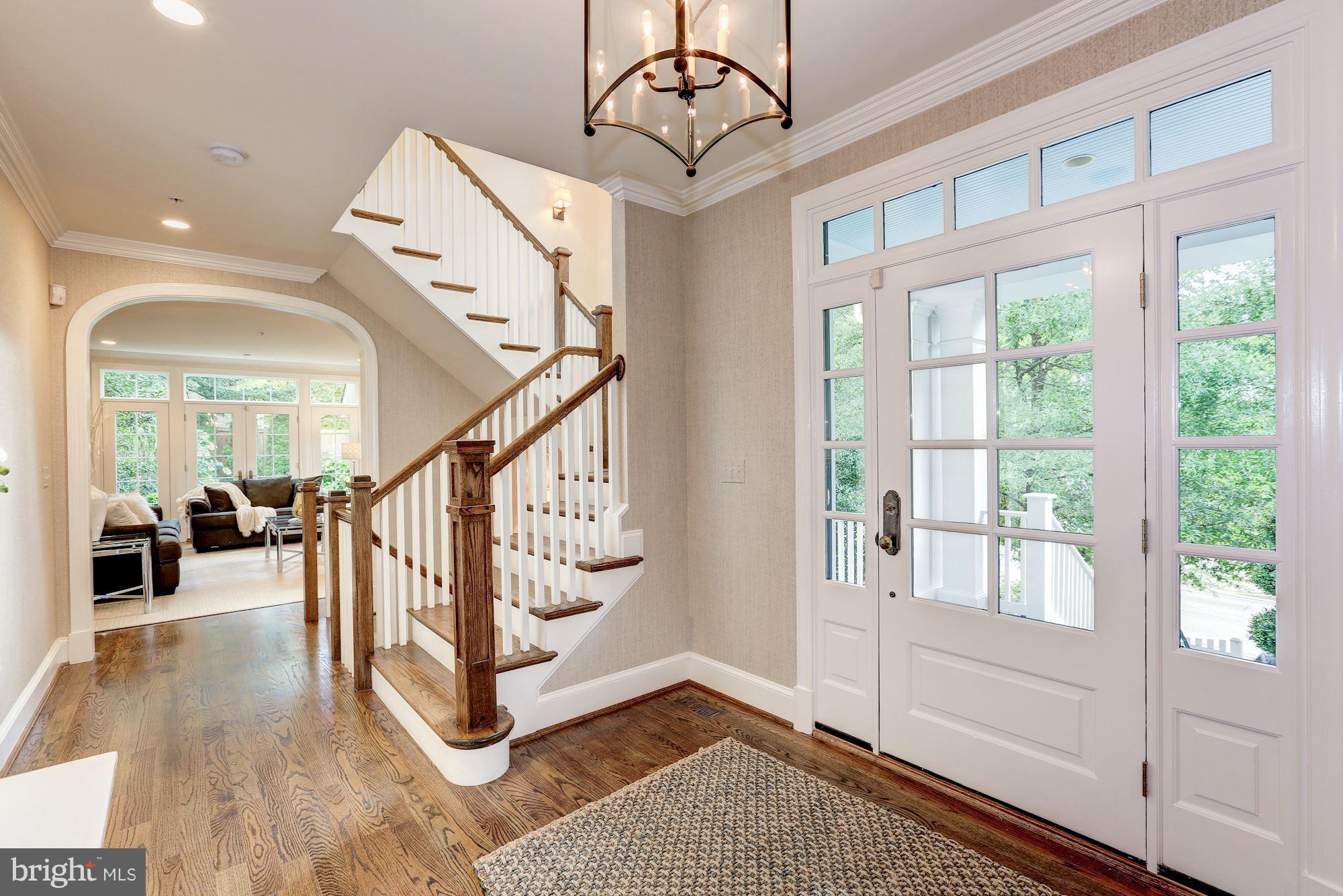 7003 Brookville Road Chevy Chase, MD 20815 - Photo 6 of 30 a view of entryway and hall with wooden floor