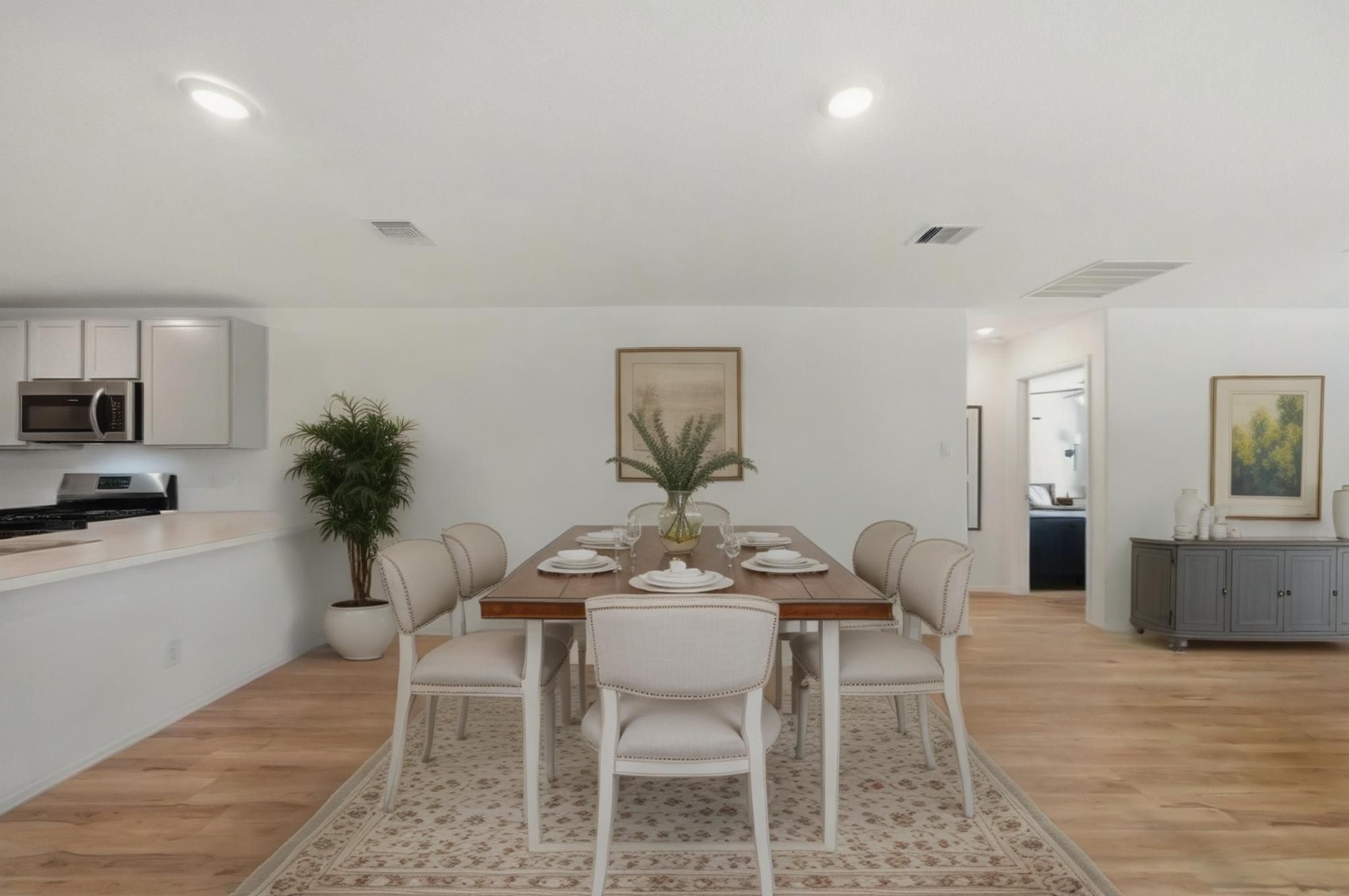 14502 Woodcott Warren Way Rosharon, TX 77583 - Photo 3 of 37 Virtually staged to highlight the potential—this dining space easily accommodates everyday living or entertaining with a variety of layout options.
