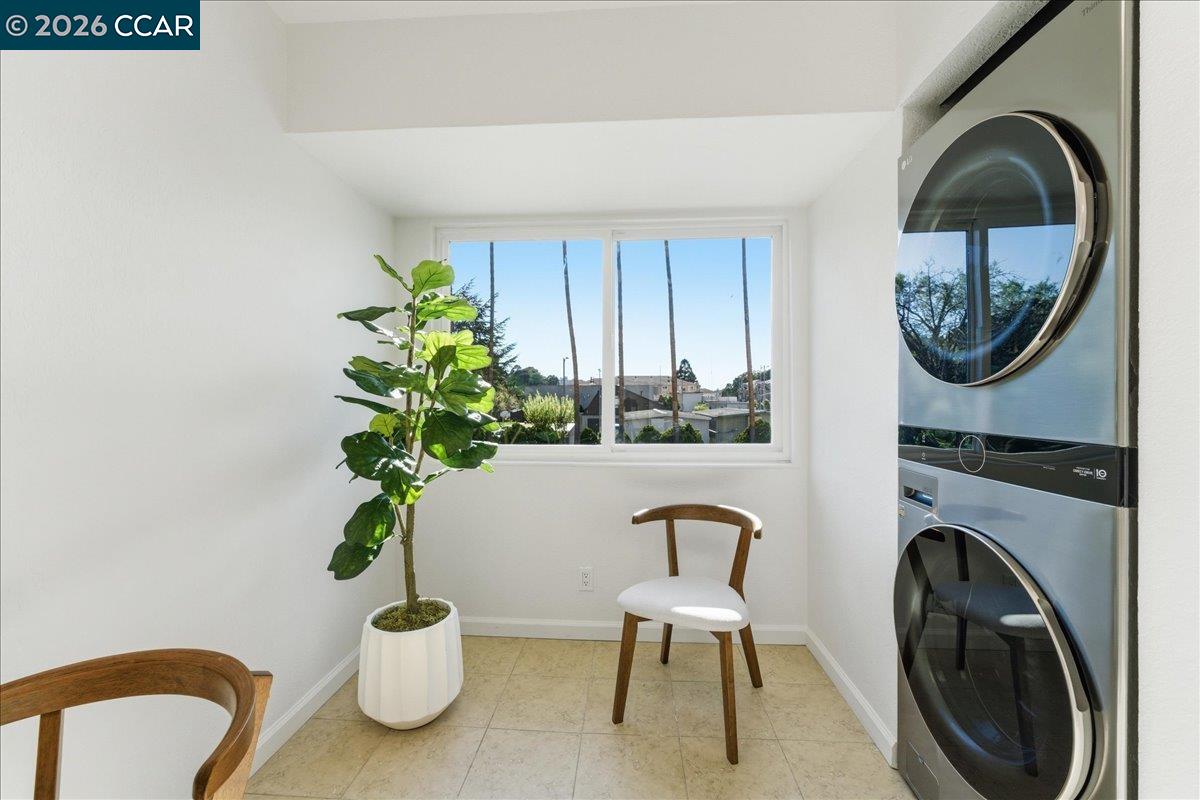 4740 Appian Way, Unit 9 El Sobrante, CA 94803 - Photo 13 of 23 a living room with furniture and a mirror