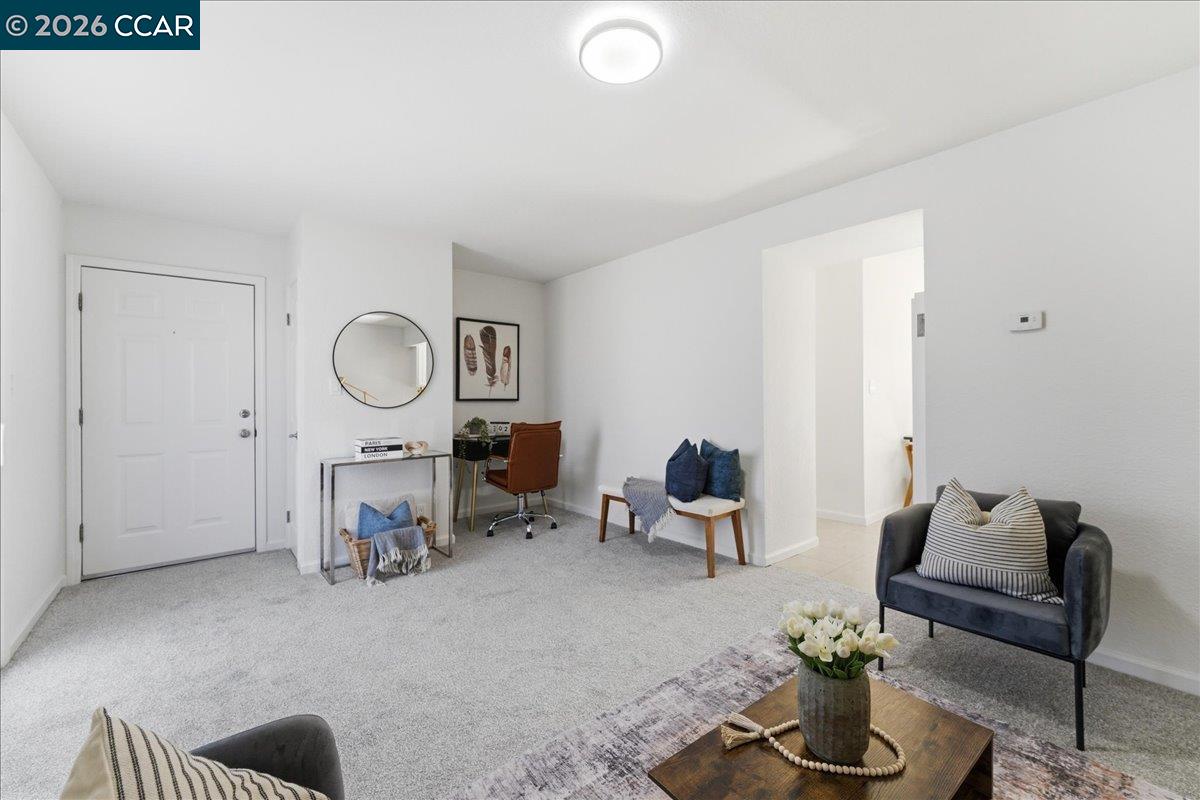 4740 Appian Way, Unit 9 El Sobrante, CA 94803 - Photo 6 of 23 a living room with furniture