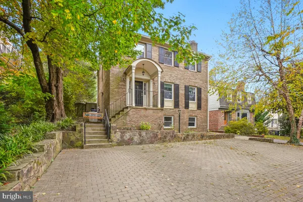 front view of a house with a street