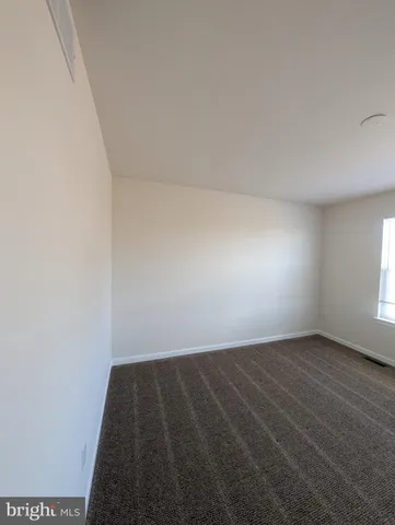 a view of balcony with wooden floor and fence