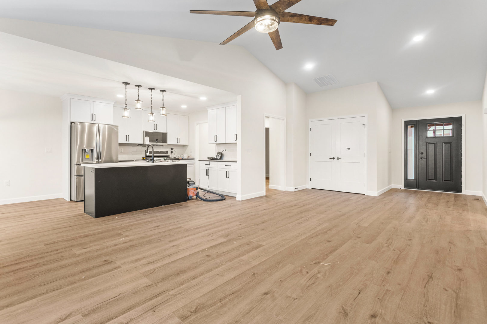 513 Patterson Drive Fisher, IL 61843 - Photo 7 of 25 a view of a kitchen with a sink and a stove top oven