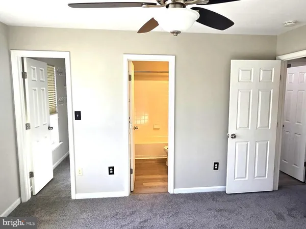 a view of a hallway with entryway