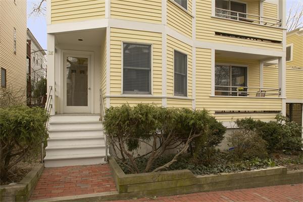 28 Surrey Street, Unit 3 Cambridge, MA 02138 - Photo 5 of 6 a view of a house with small yard