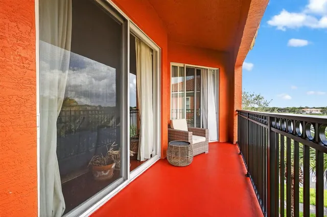 a view of a balcony with an outdoor space