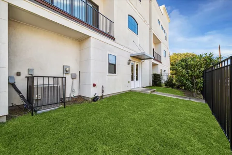 a view of a back yard of the house