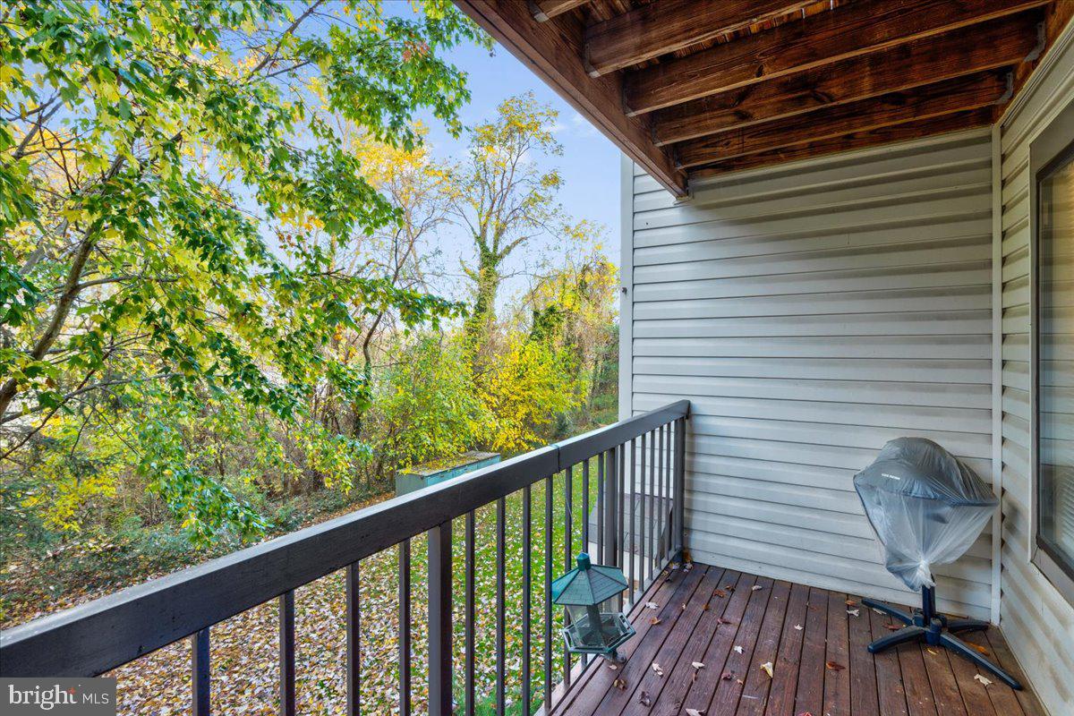 9562 Cannoneer Court, Unit 202 Manassas, VA 20110 - Photo 22 of 26 Balcony facing the rear of the community