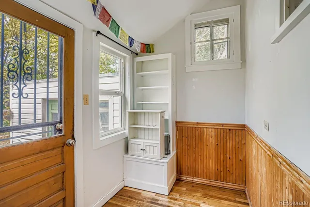 a view of walk in closet with empty room