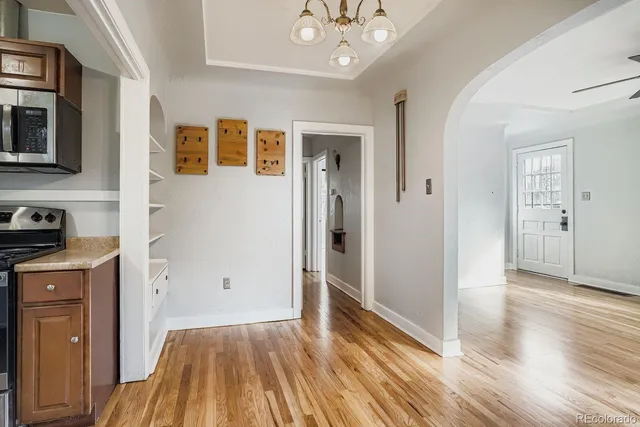 a view of a livingroom with wooden floor