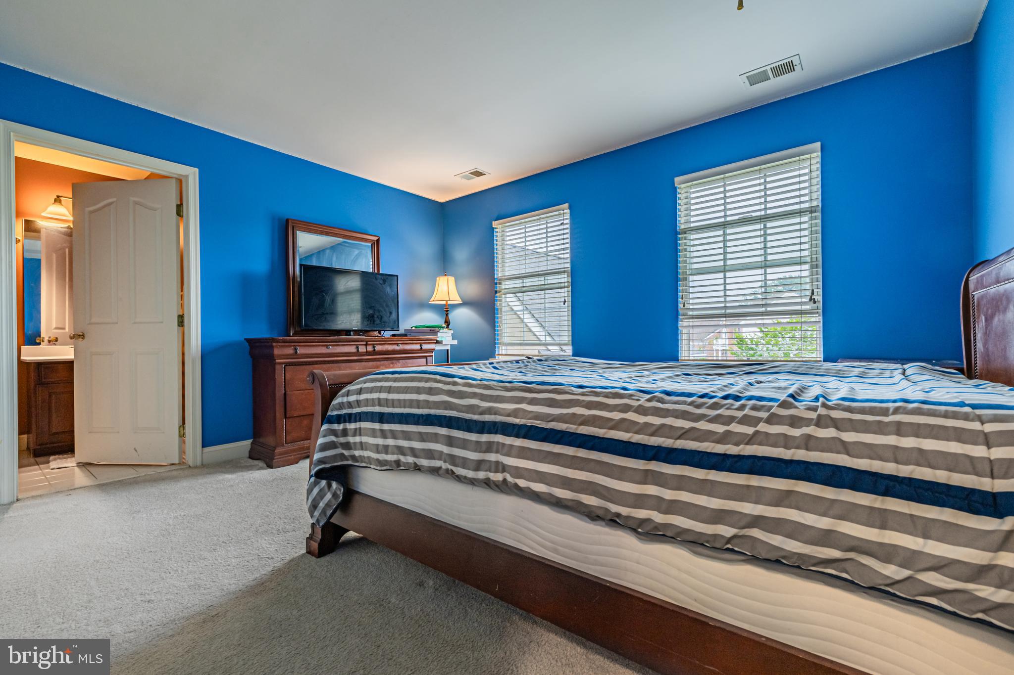 129 Blue Meadow Lane Sicklerville, NJ 08081 - Photo 18 of 25 a bedroom with a bed and a dresser