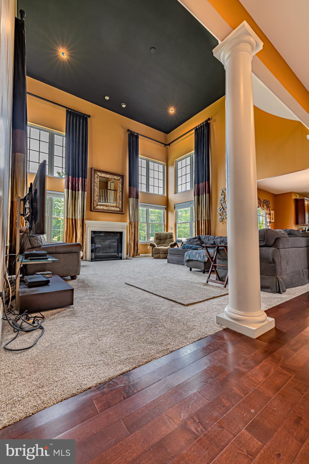 129 Blue Meadow Lane Sicklerville, NJ 08081 - Photo 19 of 25 a view of a livingroom with furniture and a fireplace
