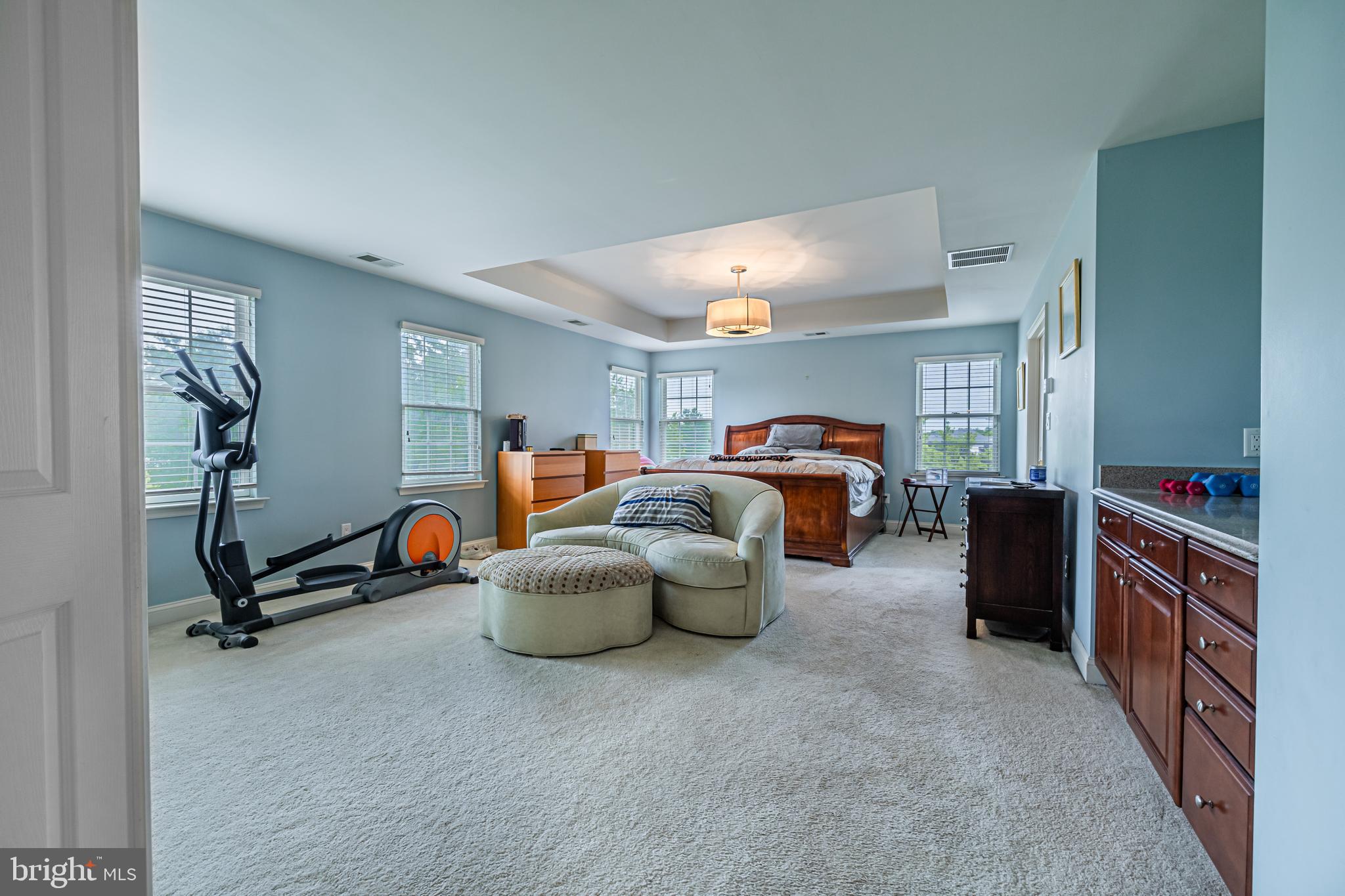 129 Blue Meadow Lane Sicklerville, NJ 08081 - Photo 6 of 25 a bed room with furniture and a window