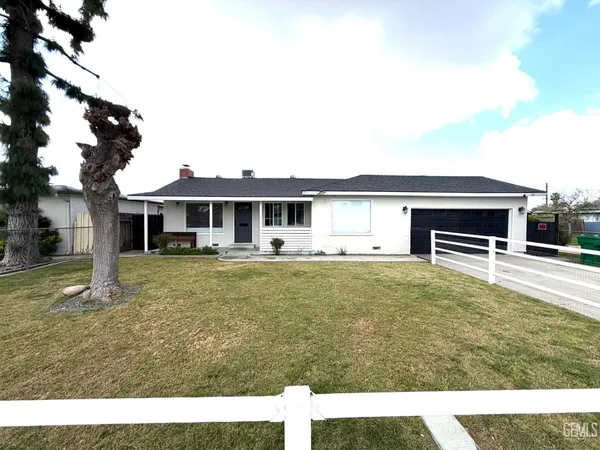 a house view with a garden space