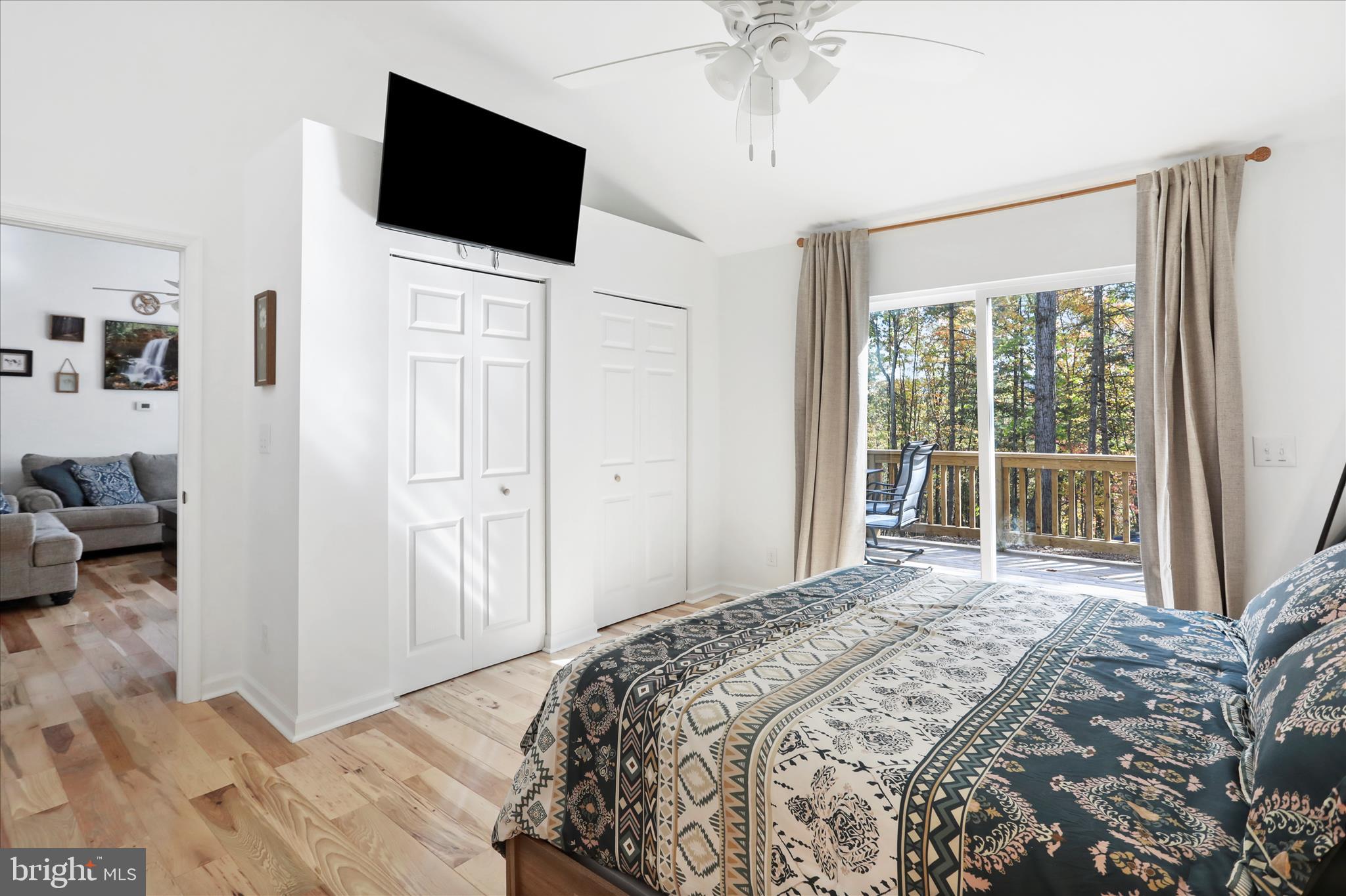 598 Crabapple Road Mount Jackson, VA 22842 - Photo 11 of 32 a bedroom with a bed tv and a window