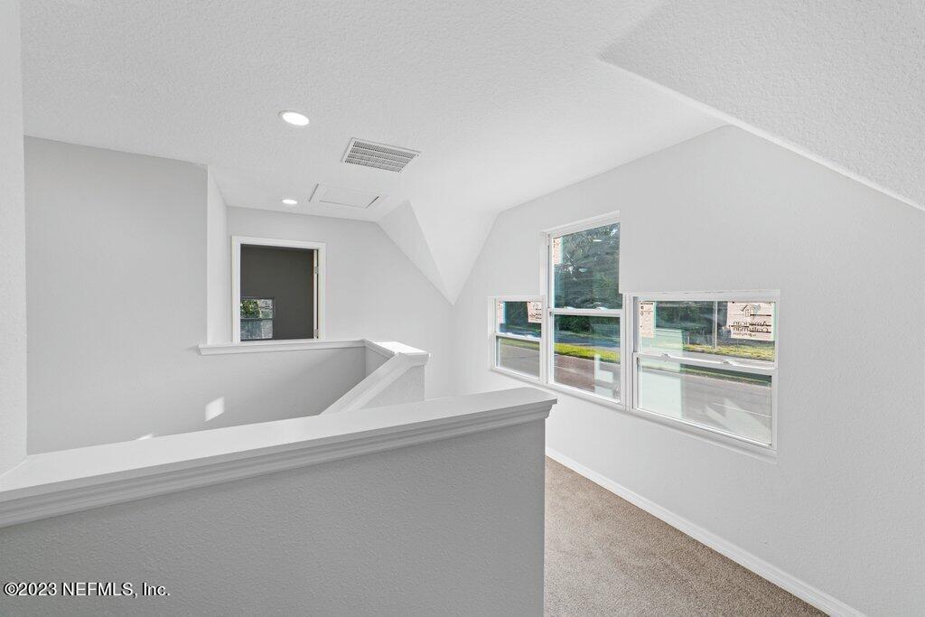 11816 Lem Turner Road Jacksonville, FL 32218 - Photo 17 of 24 a view of an empty room with a window