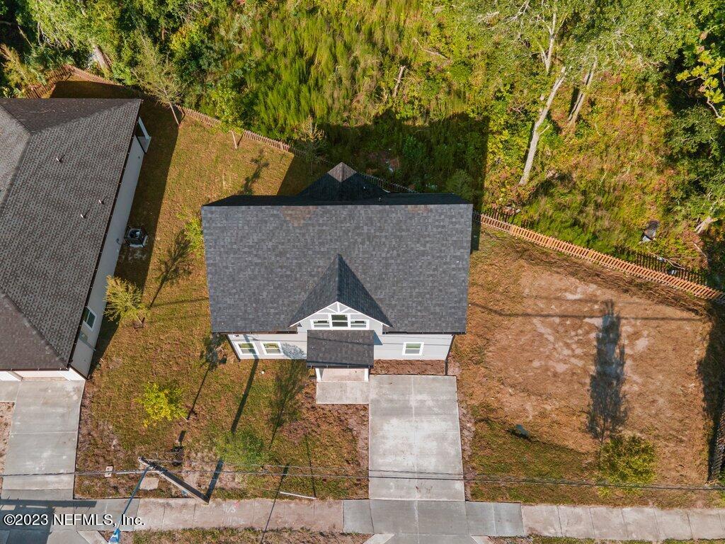 11816 Lem Turner Road Jacksonville, FL 32218 - Photo 2 of 24 a view of house with tree s