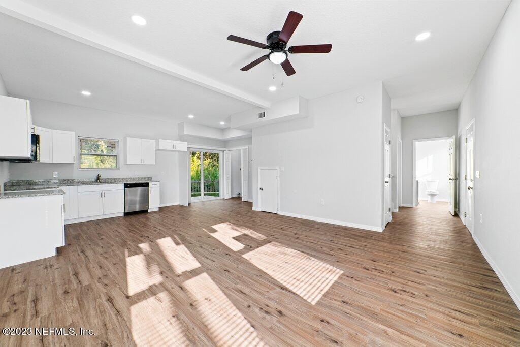 11816 Lem Turner Road Jacksonville, FL 32218 - Photo 6 of 24 a view of kitchen with sink and wooden floor