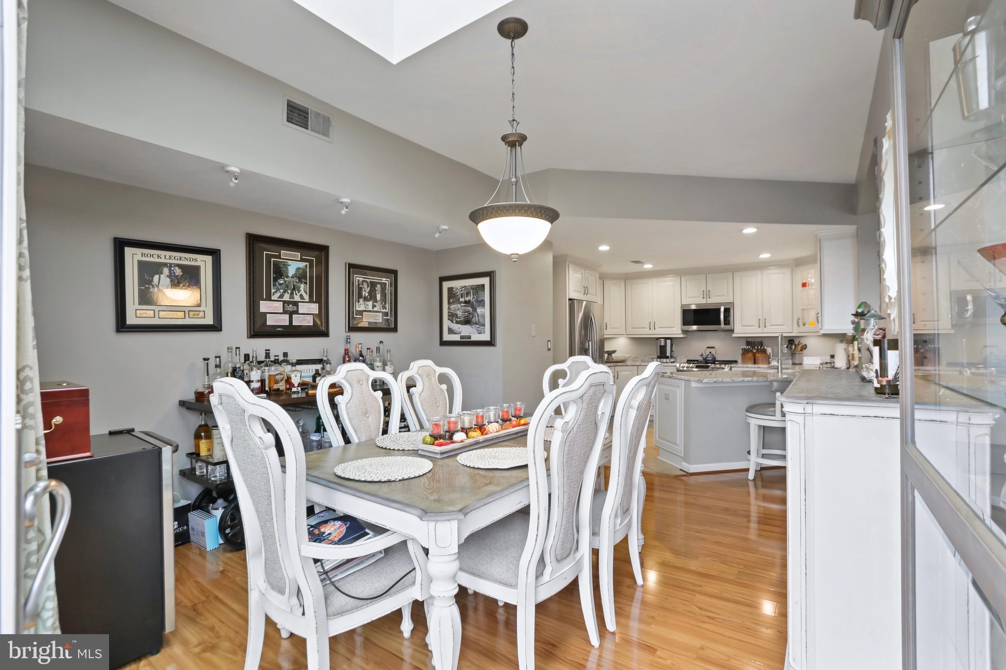 11218 Harbor Court Reston, VA 20191 - Photo 11 of 39 a view of a dining room with furniture