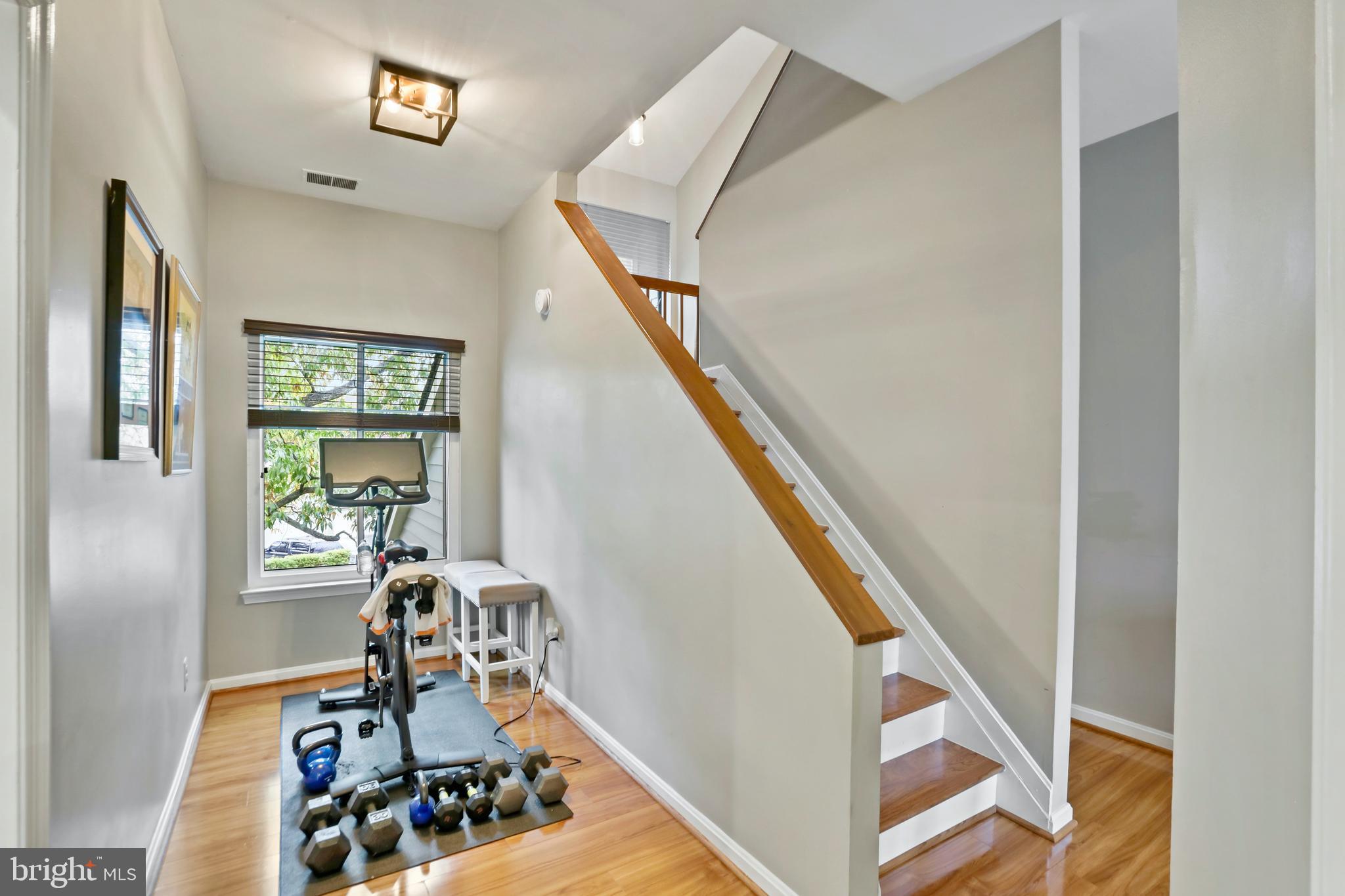 11218 Harbor Court Reston, VA 20191 - Photo 18 of 39 a view of a livingroom with furniture staircase
