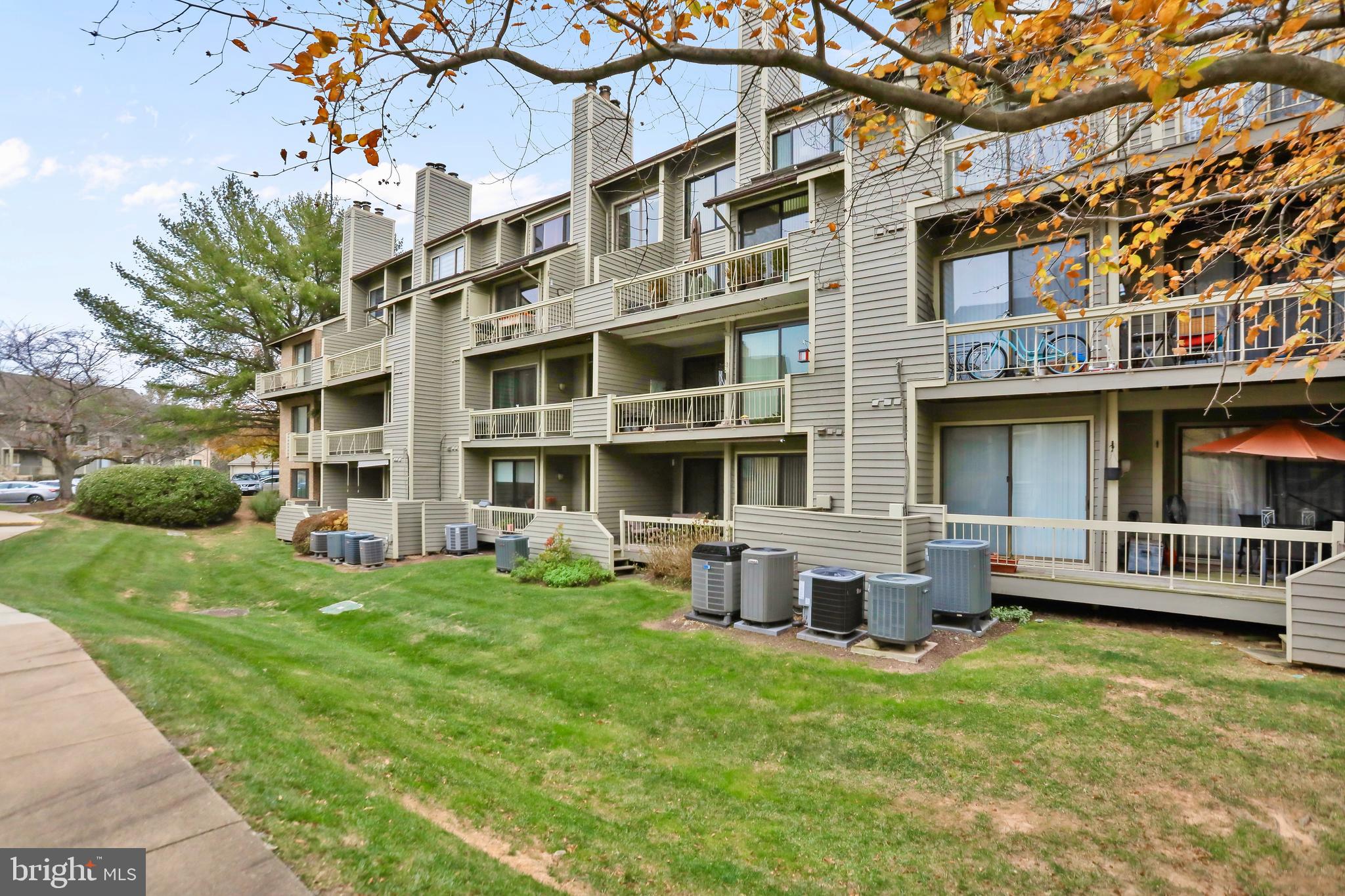 11218 Harbor Court Reston, VA 20191 - Photo 28 of 39 a view of a building with a yard