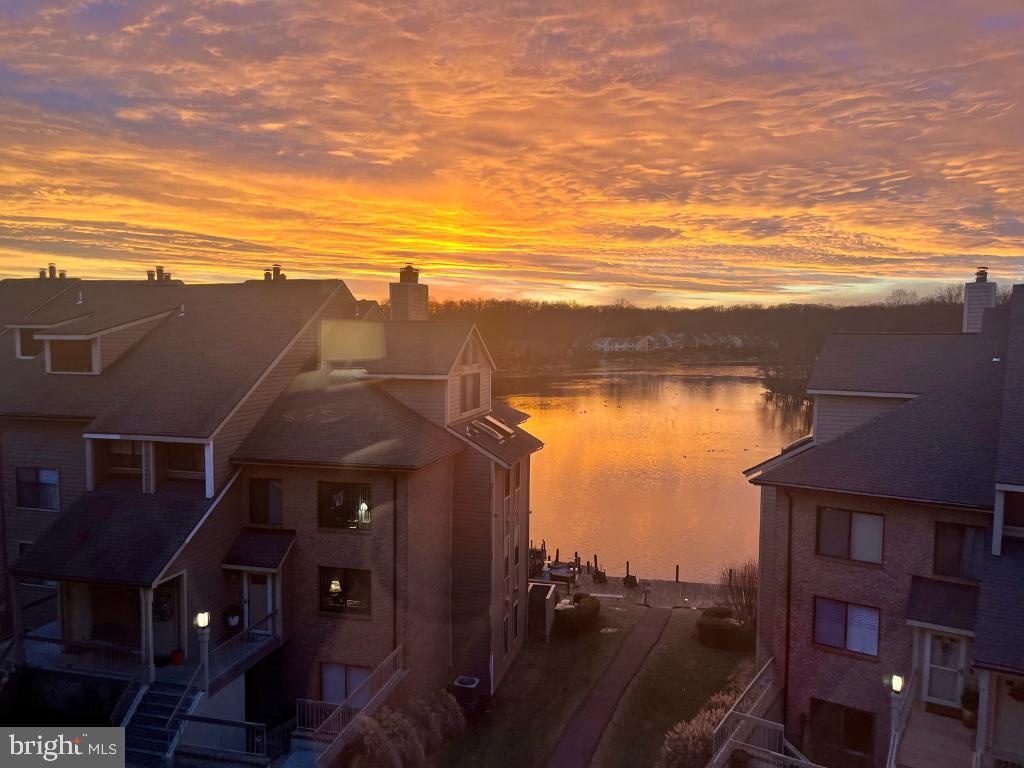 11218 Harbor Court Reston, VA 20191 - Photo 31 of 39 a view of a lake with a mountain