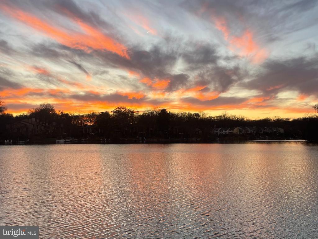 11218 Harbor Court Reston, VA 20191 - Photo 32 of 39 a view of lake with sunset