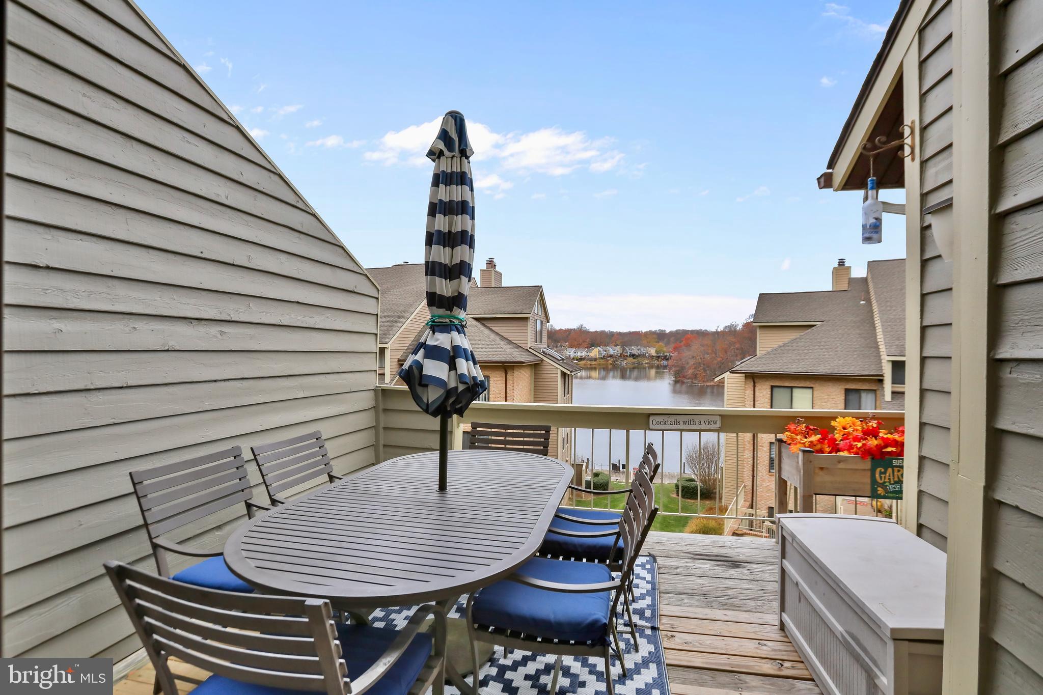11218 Harbor Court Reston, VA 20191 - Photo 7 of 39 a roof deck with couch and chairs