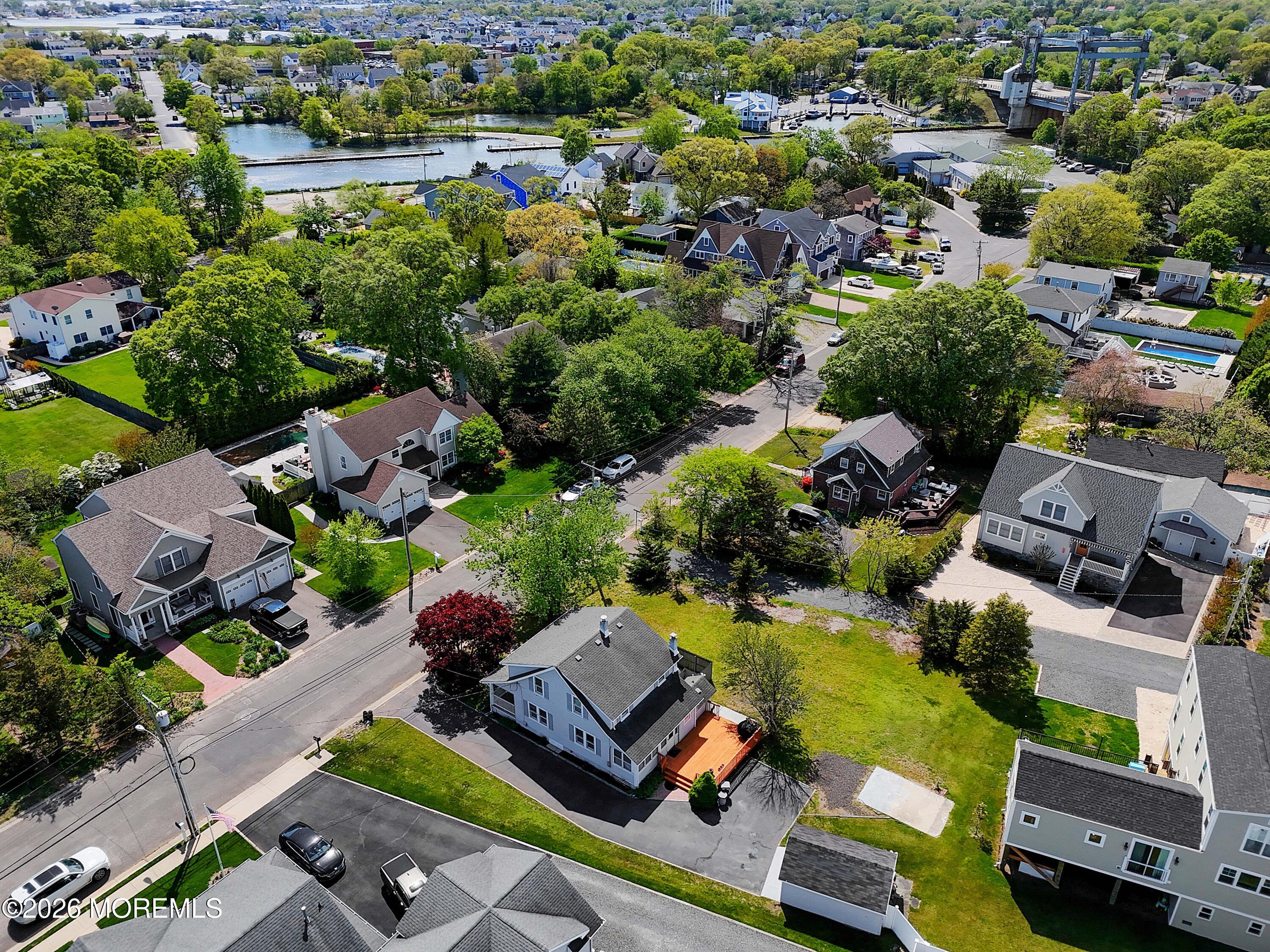 715 Howe Street Point Pleasant, NJ 08742 - Photo 45 of 45 an aerial view of a houses with a lake view