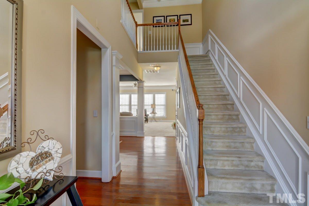 3902 Sunset Maple Court Raleigh, NC 27612 - Photo 2 of 21 a view of entryway and hall with wooden floor
