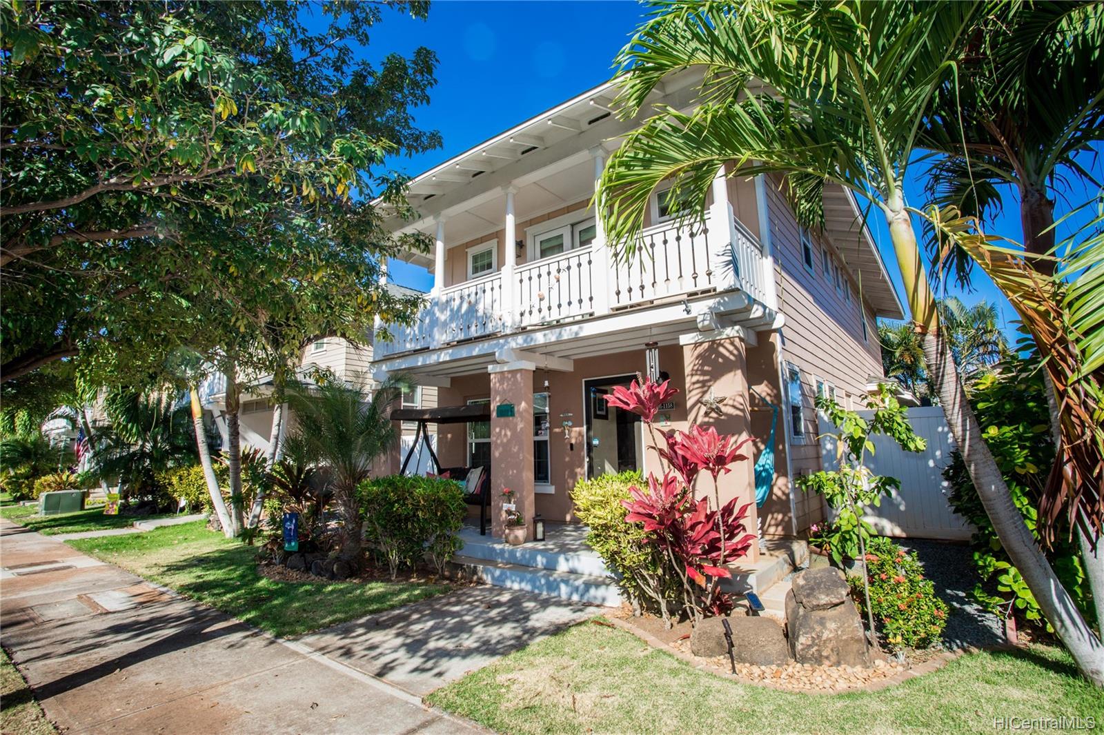 Beautiful Waiemi St.. This is prime living! Patio Lanai Decks on both levels as you keep an eye on which neighbors to invite to poker night.