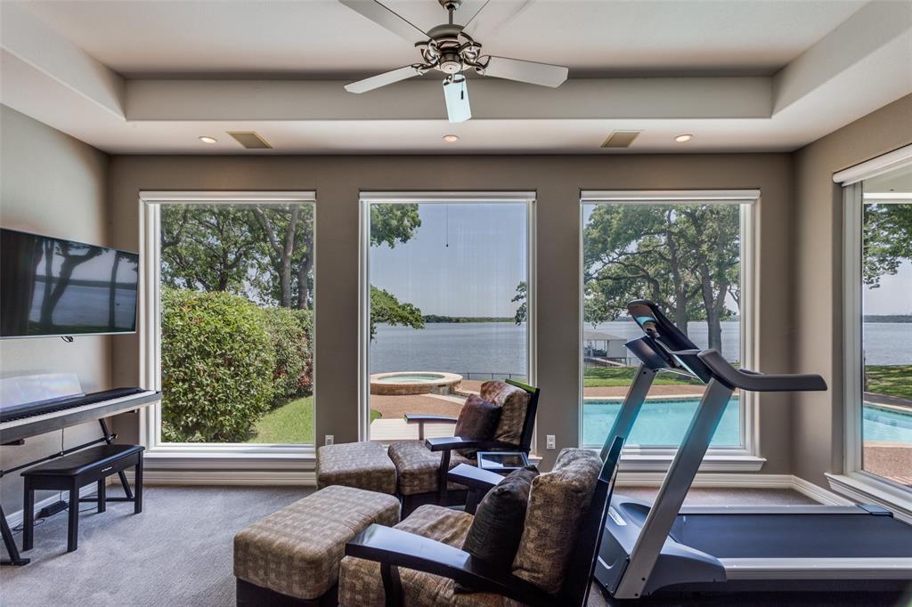 452 Windjammer Lane Azle, TX 76020 - Photo 19 of 40 a living room with furniture and a window