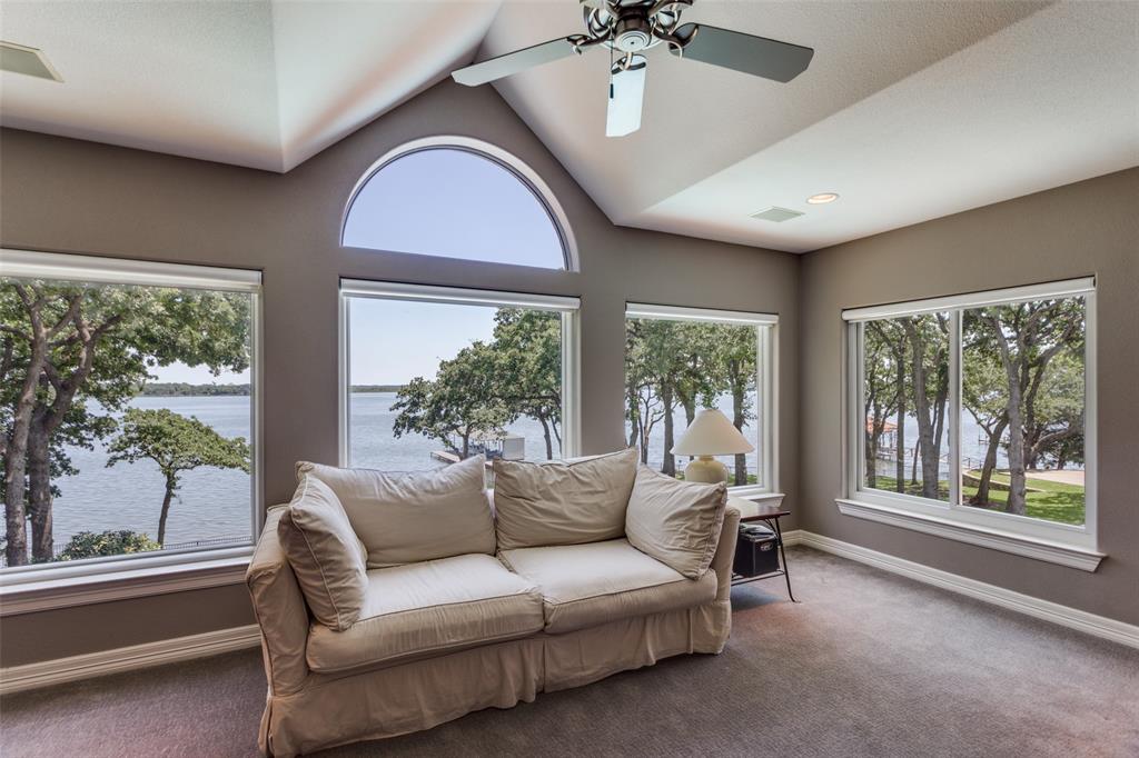 452 Windjammer Lane Azle, TX 76020 - Photo 28 of 40 a living room with furniture and a large window