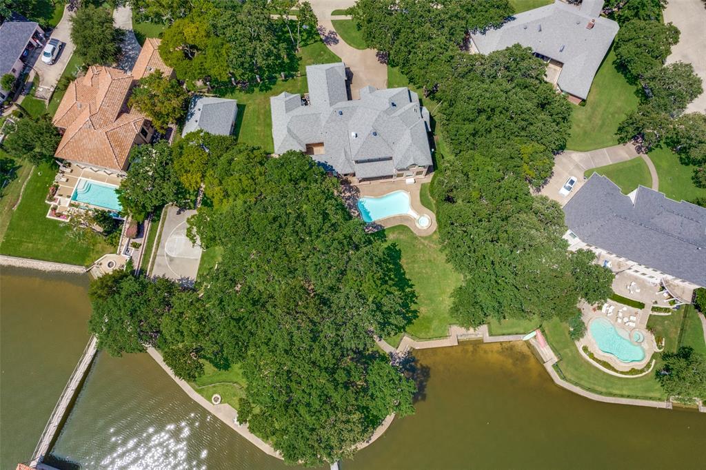 452 Windjammer Lane Azle, TX 76020 - Photo 40 of 40 an aerial view of a house with garden space and a lake view