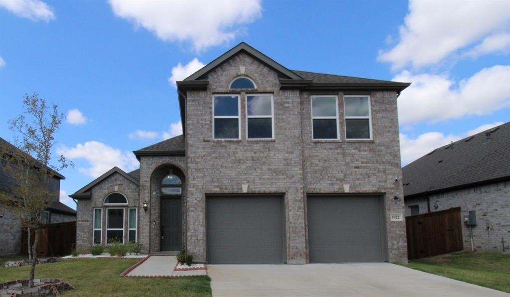 1922 Huron Drive Forney, TX 75126 - Photo 1 of 1 a front view of a house with garden