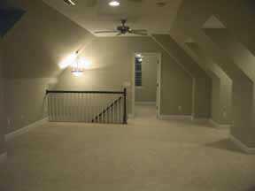 1809 Willis Court Fort Mill, SC 29708 - Photo 6 of 8 an entryway in a hall with a fan