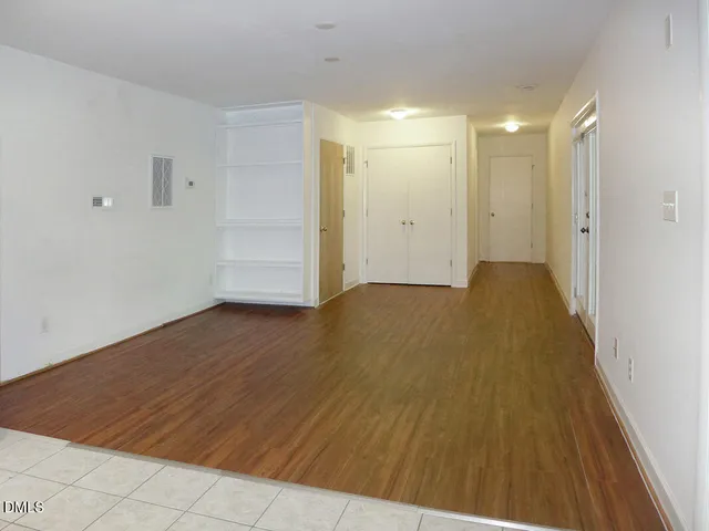 a view of a big room with wooden floor