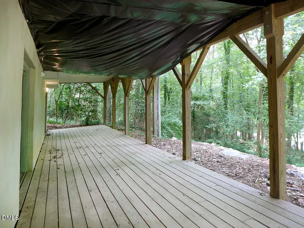 a view of backyard with green space